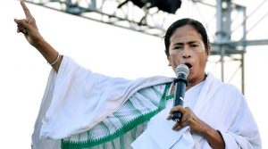 Singur: West Bengal chief minister Mamata Banerjee addresses farmers during a programme at Singur, West Bengal on Wednesday. Banerjee handed over land parchas (land deeds) and compensation cheques to farmers during the programme. PTI Photo by Swapan Mahapatra   (PTI9_14_2016_000224A)